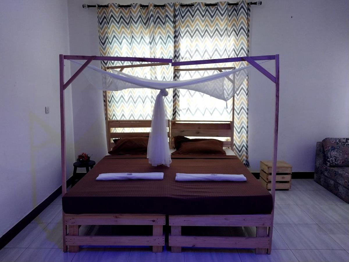 L&J Modern Backpackers Kigamboni Beach House Bed & Breakfast Dar es Salaam Exterior photo